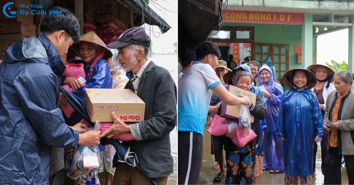 Bà con phường Kim Trà vui mừng khi nhận quà cứu trợ